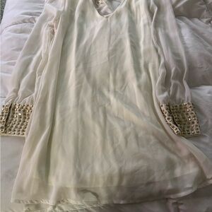 Elegant Cream Dress with Embellished Cuffs
